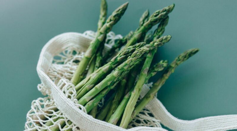 a fresh asparagus on a mesh bag
