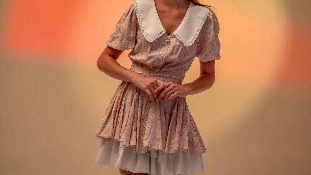 Editorial summer dress shot illustrating drop waist dresses UK 2026 trend