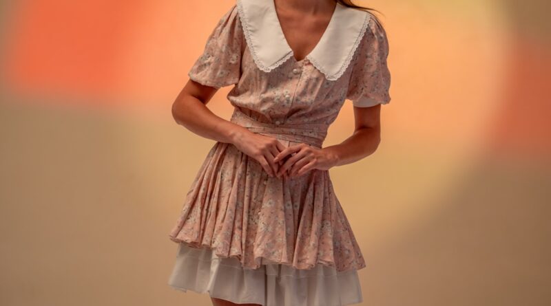 Editorial summer dress shot illustrating drop waist dresses UK 2026 trend