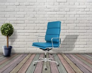 Minimalist home office chair uk 2026 setup with desk and laptop in a bright room