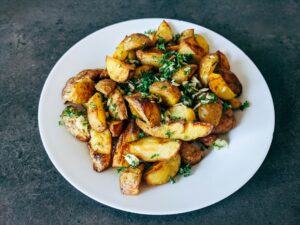 Jersey Royals recipes: fresh new potatoes on a board ready for weeknight cooking