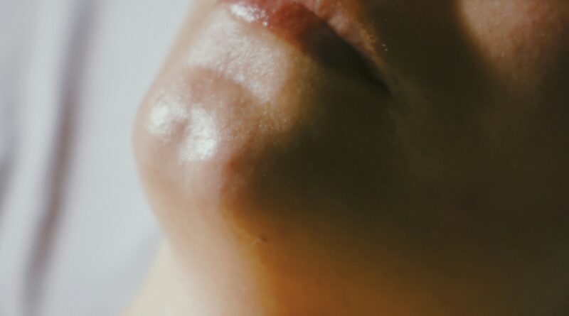 Woman using an LED face mask - best LED face masks UK