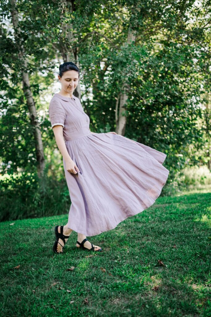 Woman wearing a linen dress outdoors in summer