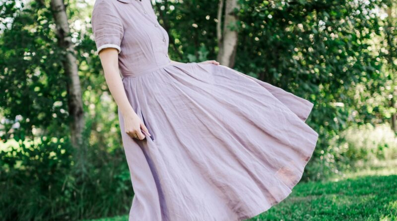 Woman wearing a linen dress outdoors in summer