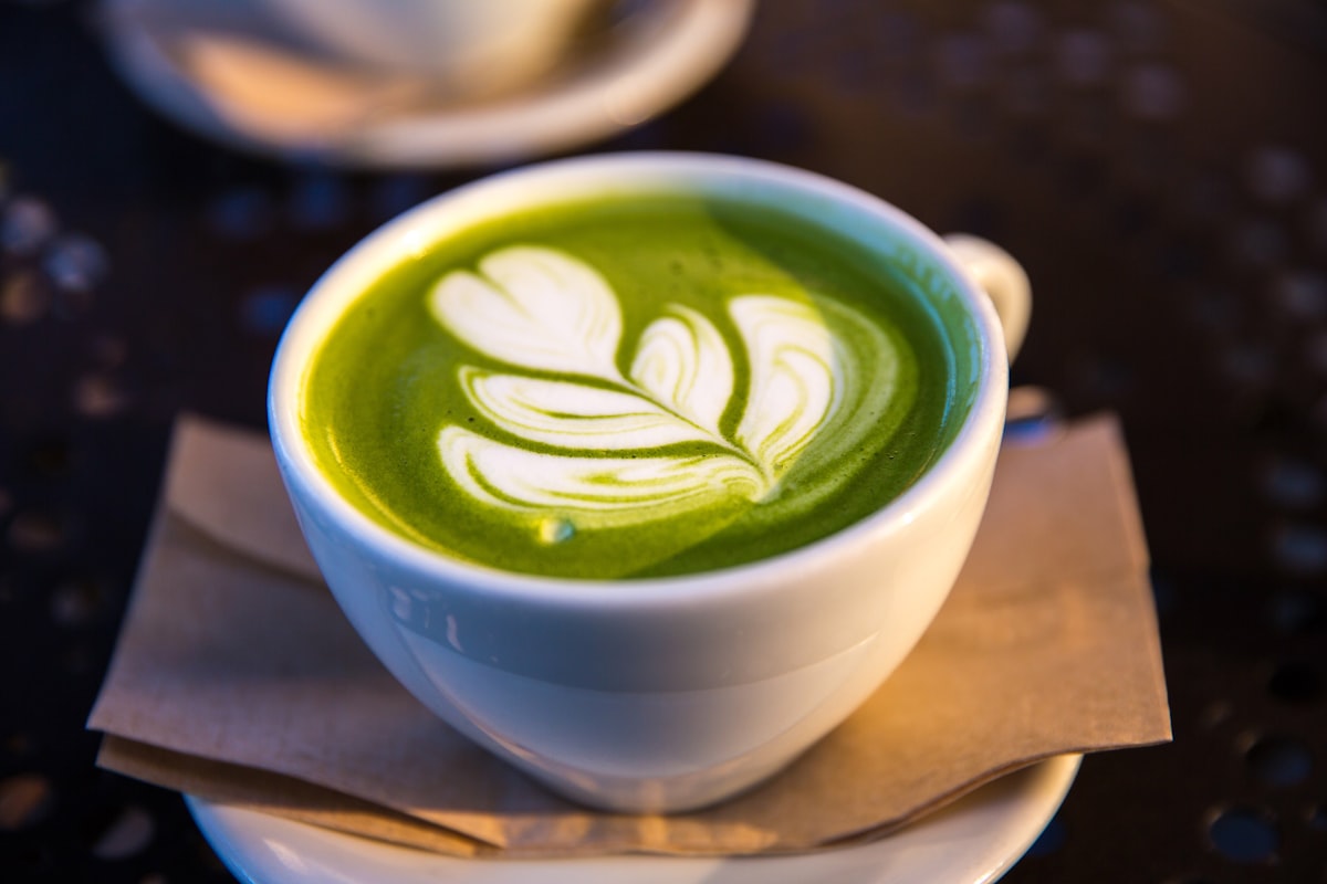 Bowl of vibrant green matcha powder for easy matcha recipes at home