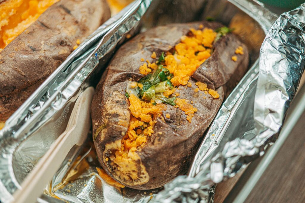 a close up shot of a baked sweet potato