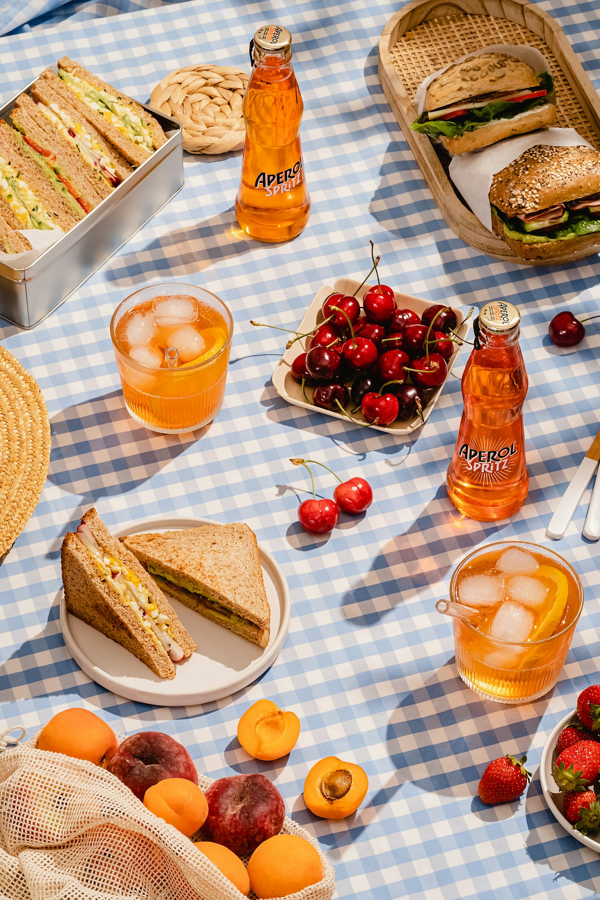 Picnic food ideas laid out on an outdoor table