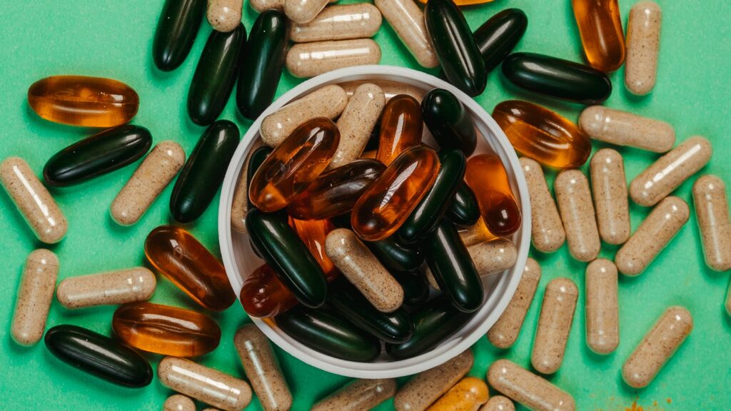 Herbal supplement capsules in a flat-lay arrangement, illustrating a berberine UK supplement piece