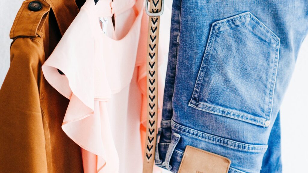 A wardrobe rail showing the kind of high street pieces crochet dresses UK shoppers will pair with for summer 2026.