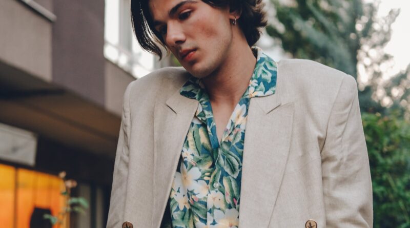 A relaxed open-neck cuban collar shirt styled with linen tailoring - summer 2026 dressing.
