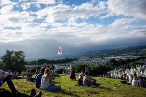 Festival crowd at Worthy Farm illustrating the Glastonbury 2026 fallow year and the wider British festival summer.