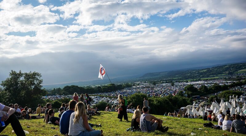 Festival crowd at Worthy Farm illustrating the Glastonbury 2026 fallow year and the wider British festival summer.