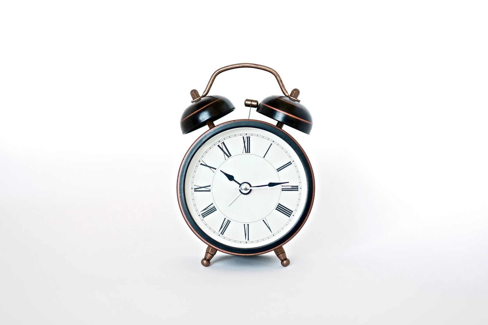 Alarm clock on a bedside table representing the 3am wake-up many mouth taping UK users describe