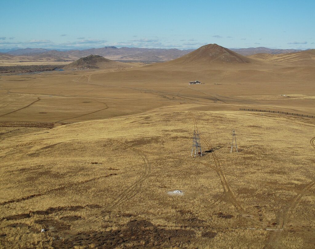 Sweeping Mongolian steppe landscape evoking the kind of terrain Race Across the World BBC contestants cross.