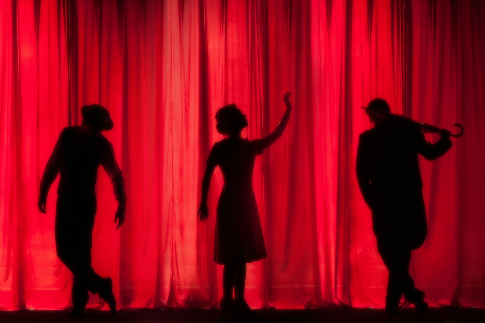Performers on a theatre stage, the kind of live-on-screen content increasingly programmed by UK indie cinemas