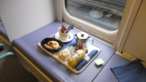 A Caledonian Sleeper train at a UK station - UK sleeper train holidays 2026