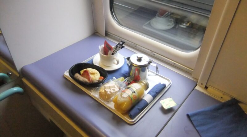 A Caledonian Sleeper train at a UK station - UK sleeper train holidays 2026