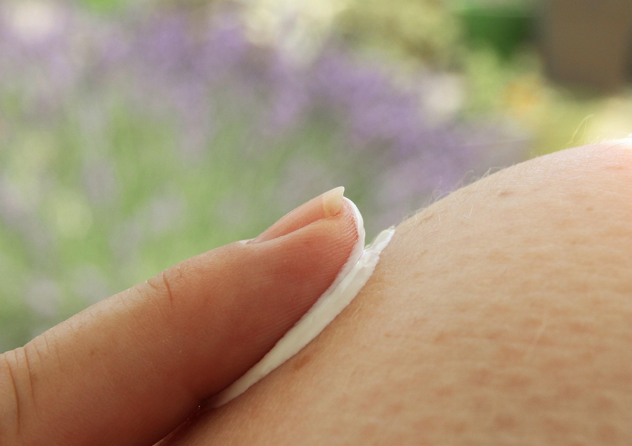 Applying moisturiser as part of an evening pollen-season skincare reset