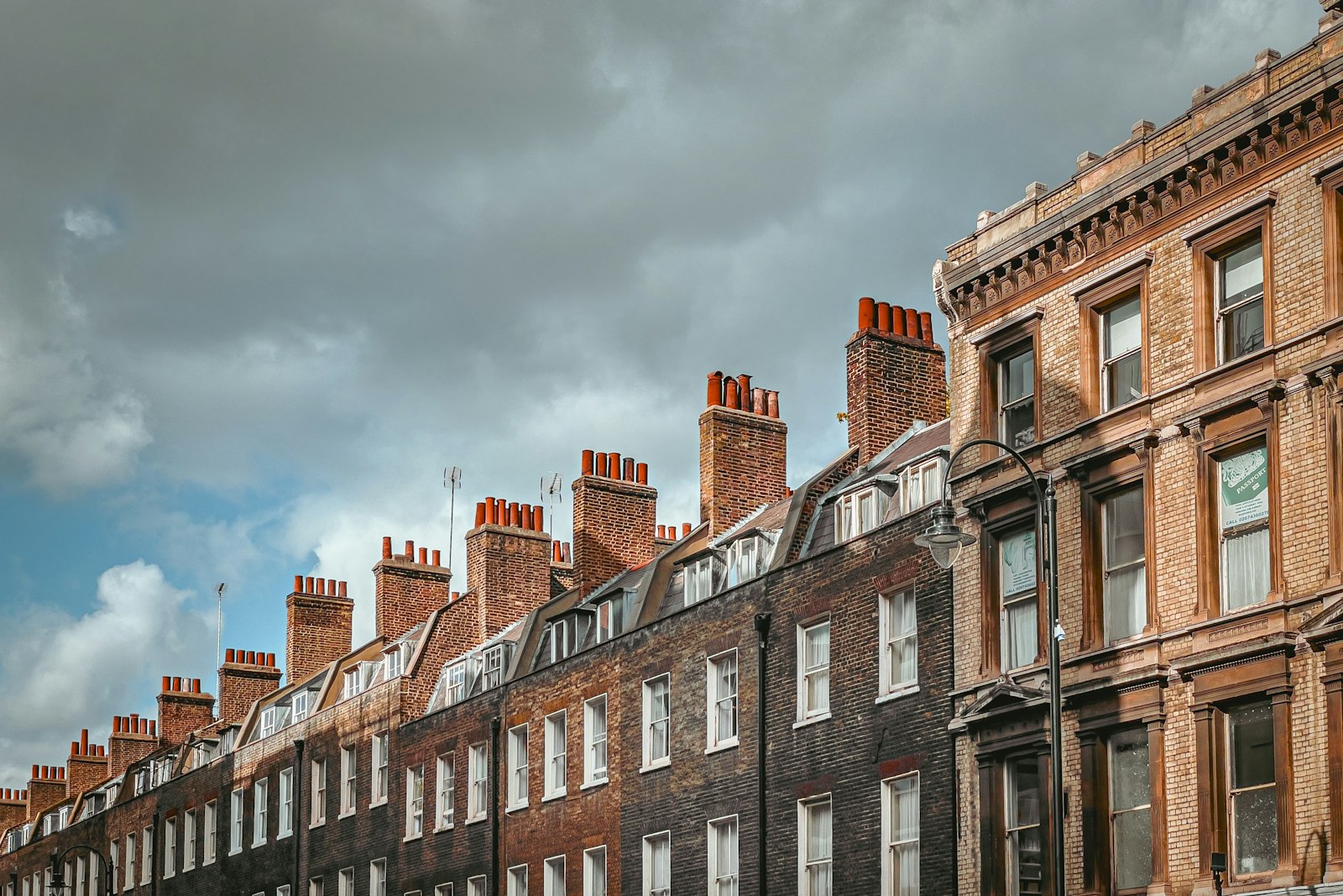 Row of British brick terraced houses built to retain heat in winter