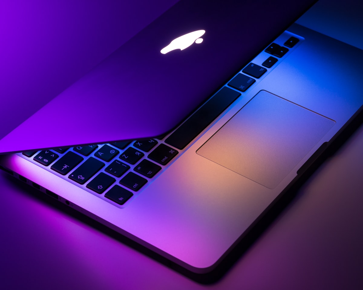 MacBook keyboard close up, USB-C portable monitor power use
