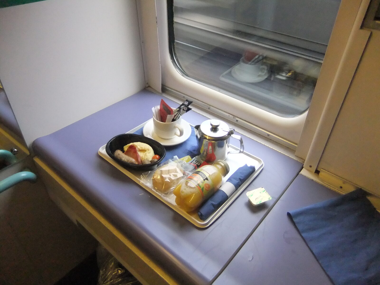 Caledonian Sleeper train at the platform, one of the main UK sleeper trains running in 2026