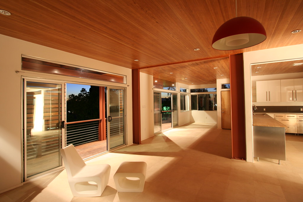 Open-plan rooms can feel aimless - a sunken zone gives them a centre, but so do cheaper tricks