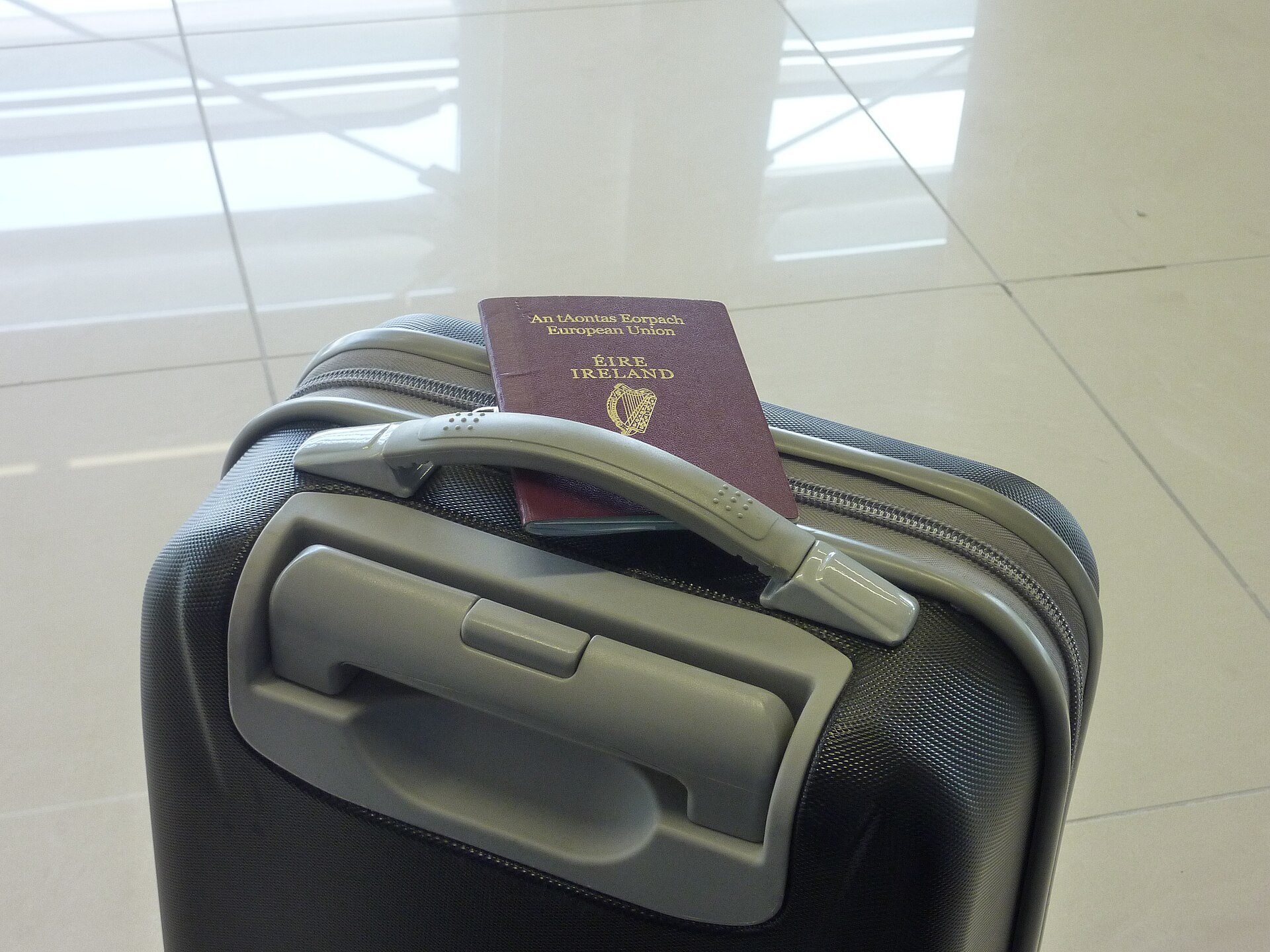 A backpack-style underseat cabin bag carried through an airport