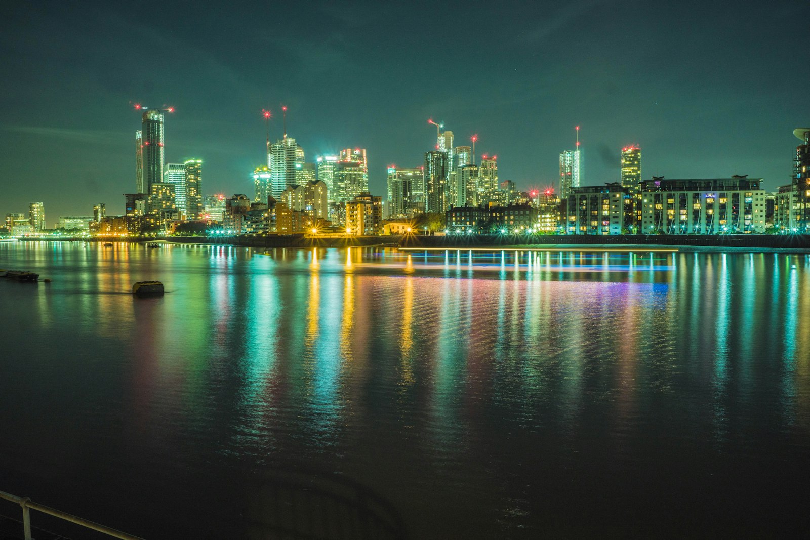 London office towers lit up at night, the world Industry has skewered for four series