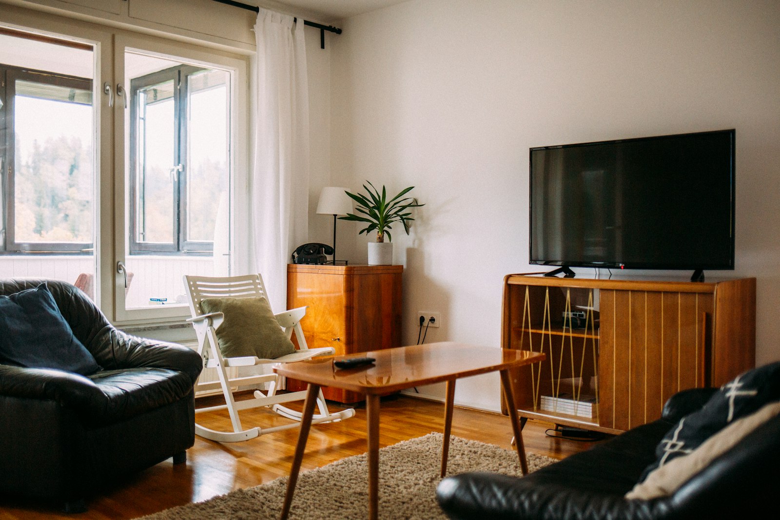Budget 4K television on a wooden media unit in a British living room