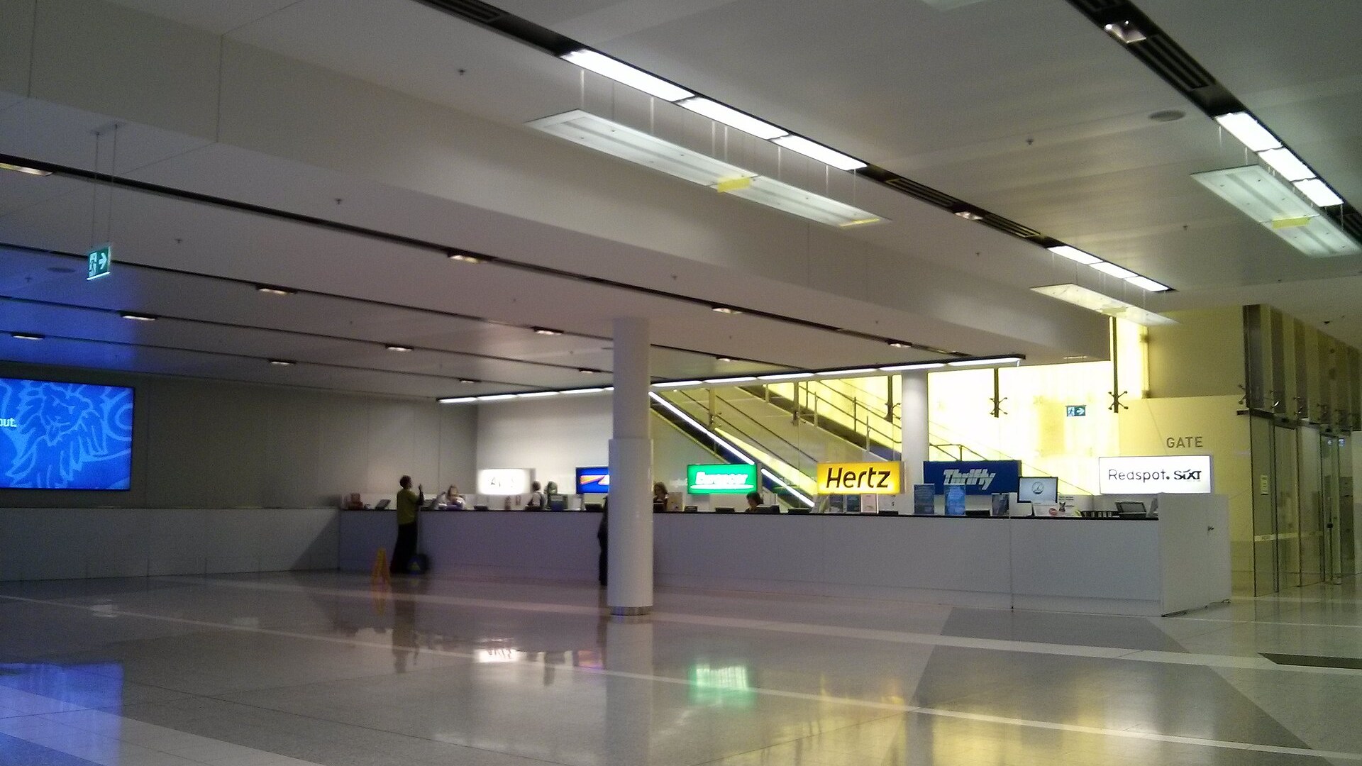 Car hire desks at an airport terminal, where excess waivers are sold at their most expensive