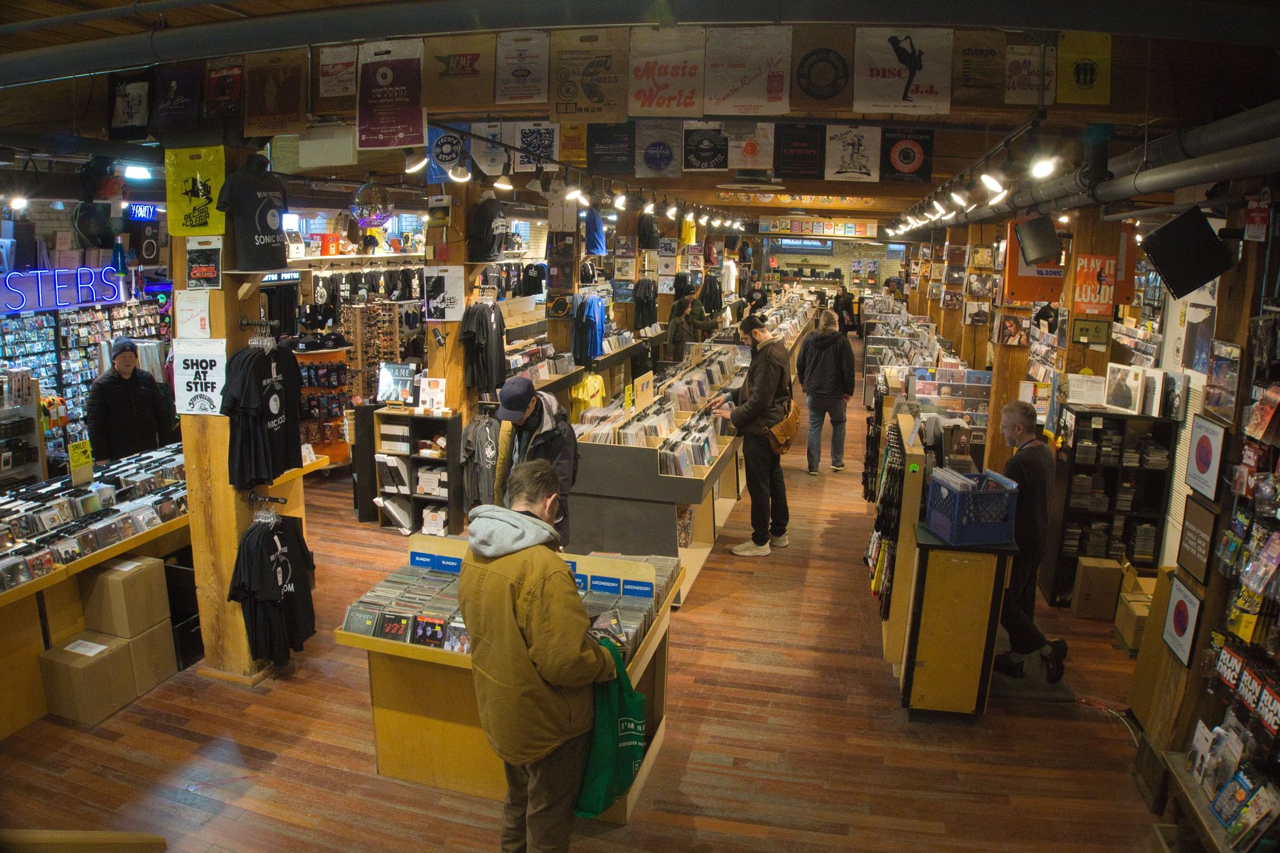 Racks of vinyl records in a shop, the only place the Music Fashion Film B-sides lived until this week