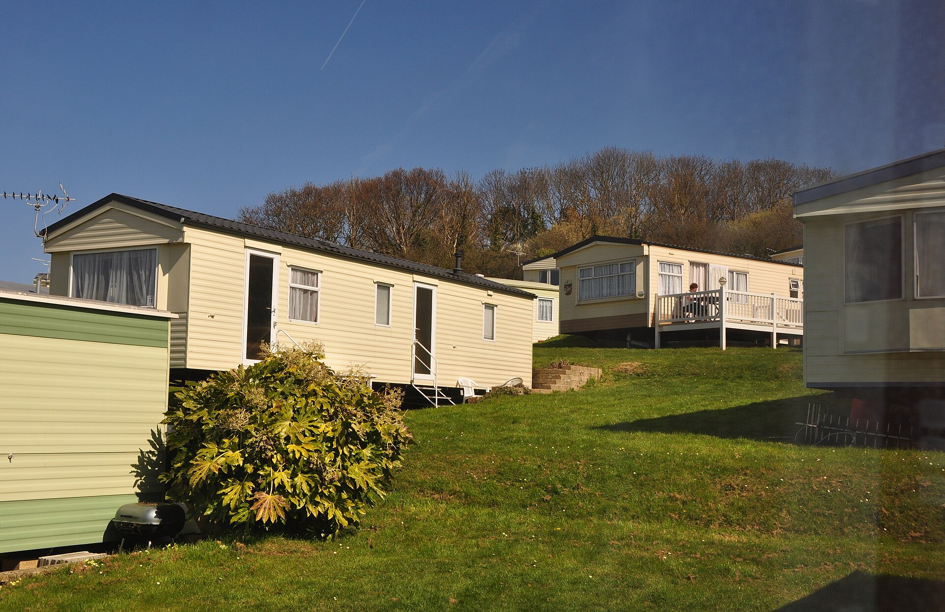 Static caravans at a UK coastal holiday park, the standard-grade option that keeps cheap family holidays UK possible in August