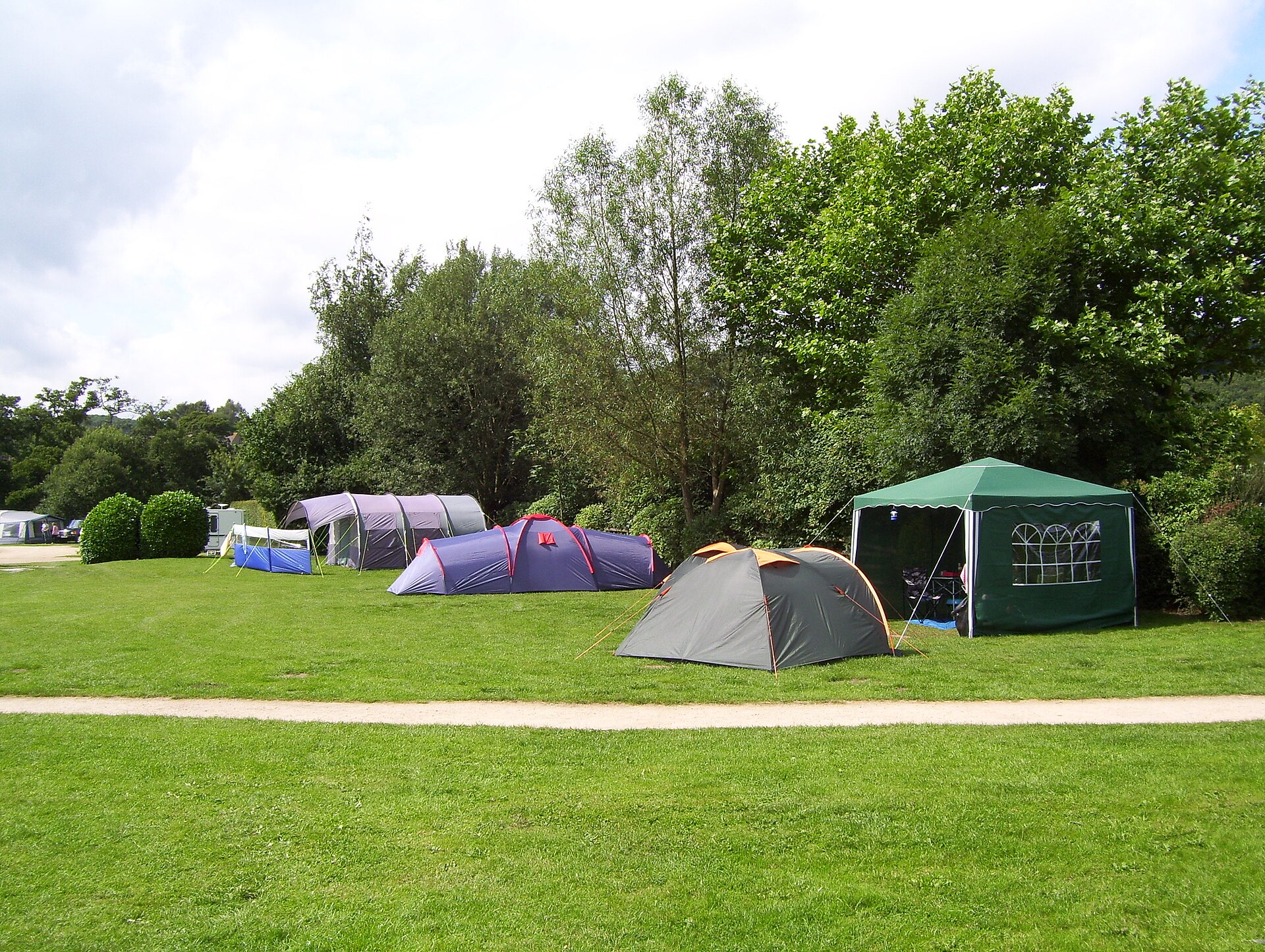 Family tents pitched at a British campsite in summer