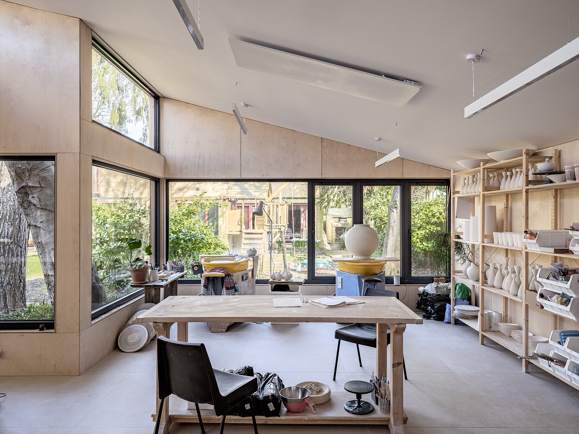 Inside a garden room fitted out as a pottery studio