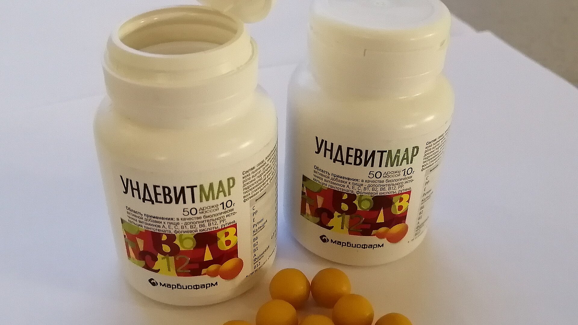 A spread of vitamin and supplement pills, the crowded market NMN supplements now sit within