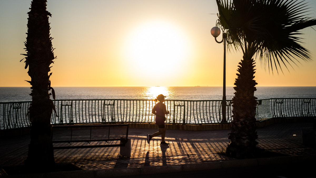 A person running at sunrise - the exercise that beats NMN supplements on evidence for healthy ageing