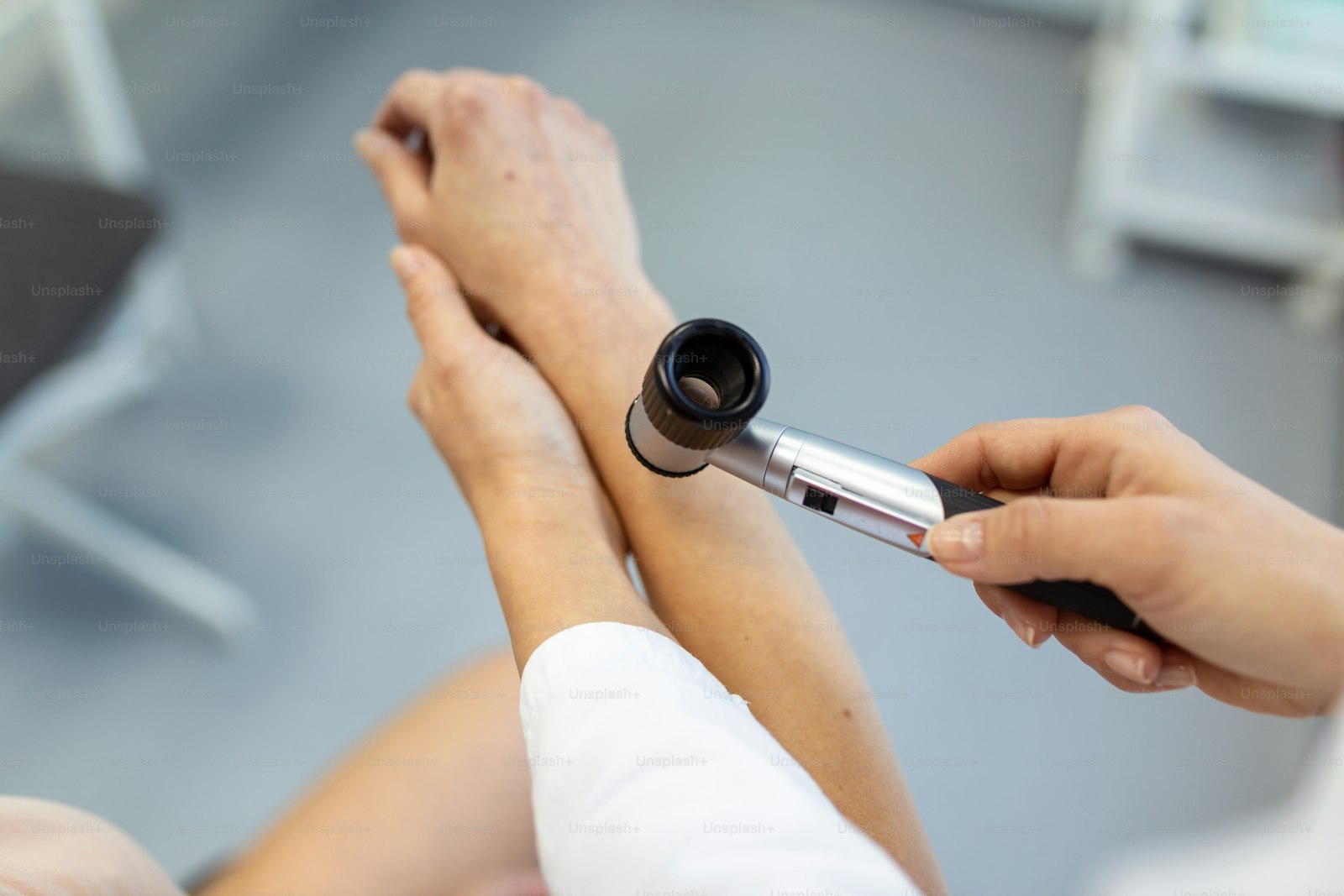 Dermatologist examining skin, the context where injectable PDRN skincare has the strongest evidence