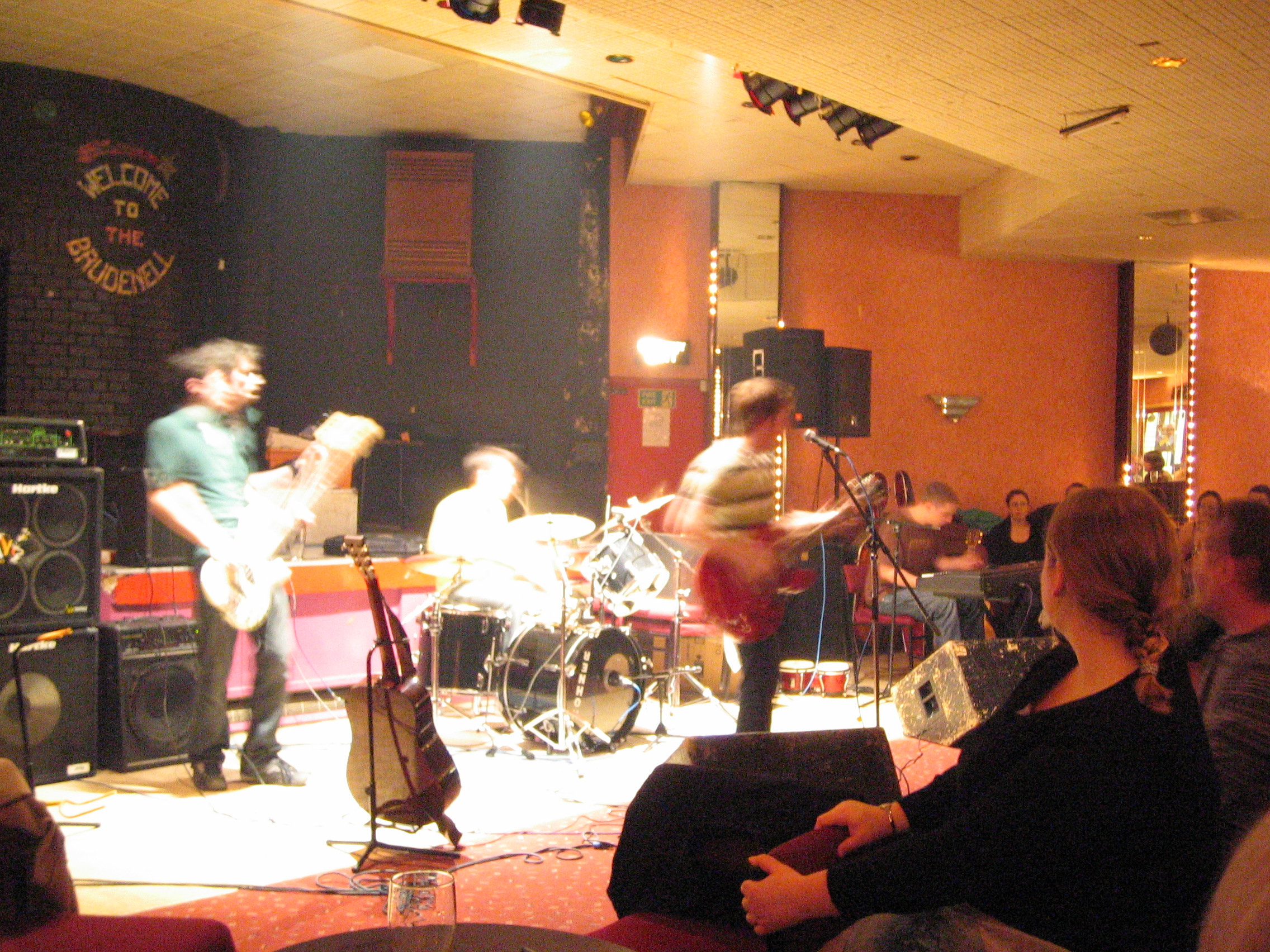 Band playing to a small crowd at the Brudenell Social Club in Leeds