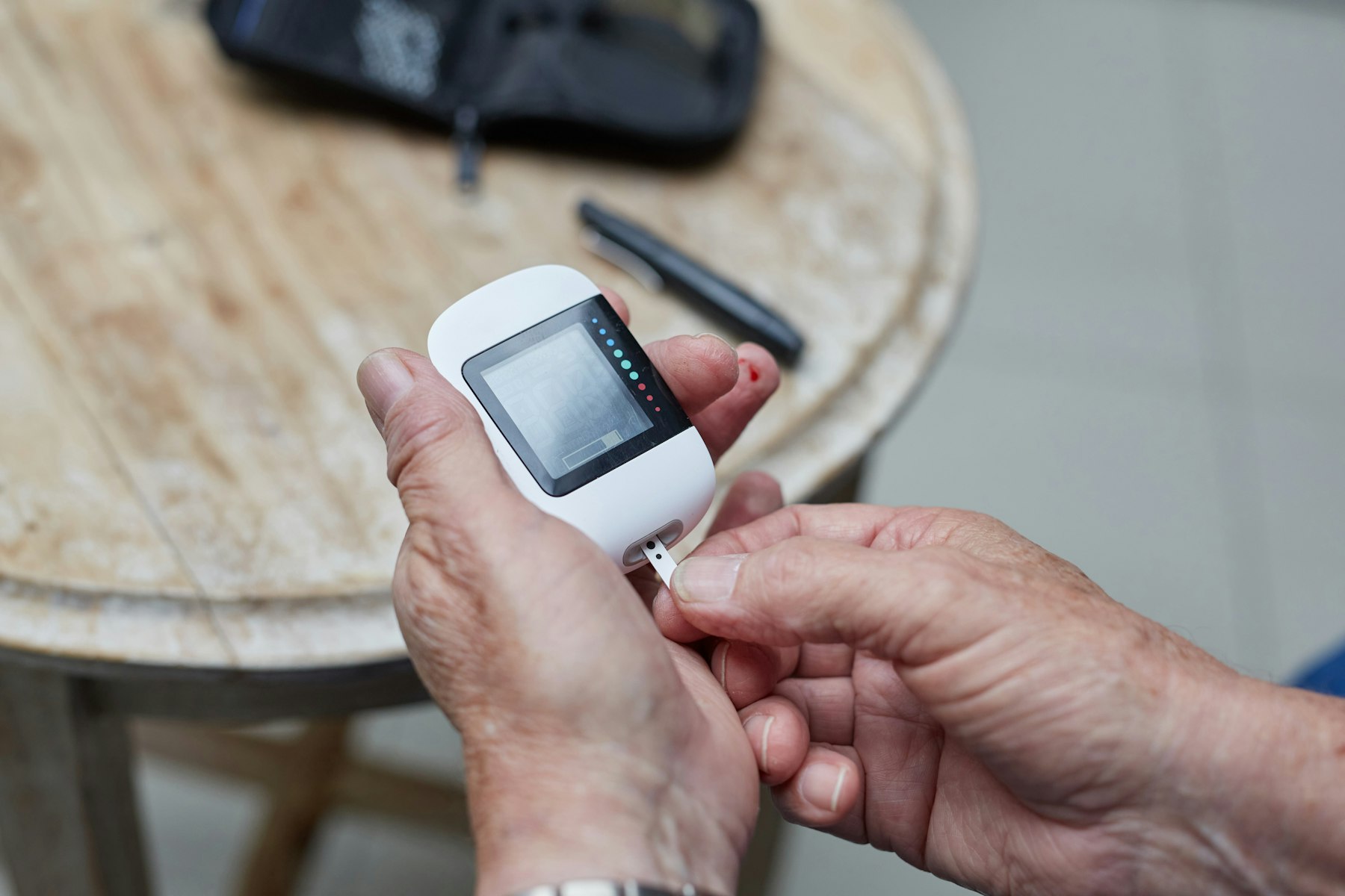 A finger-prick blood test - the standard the continuous glucose monitor was measured against in the Bath study