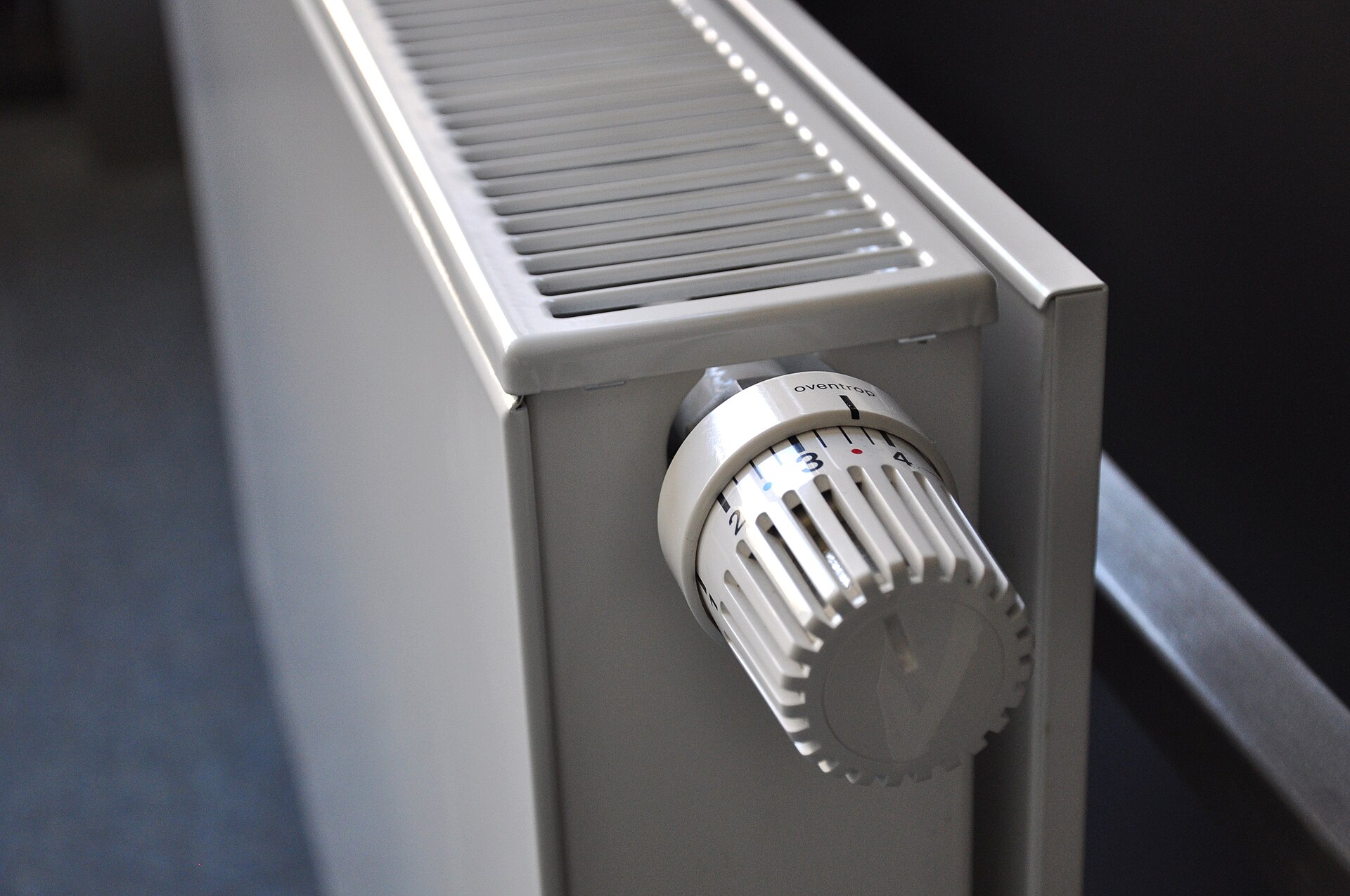 A domestic radiator on a painted wall, the starting point for most energy saving gadgets in a UK home