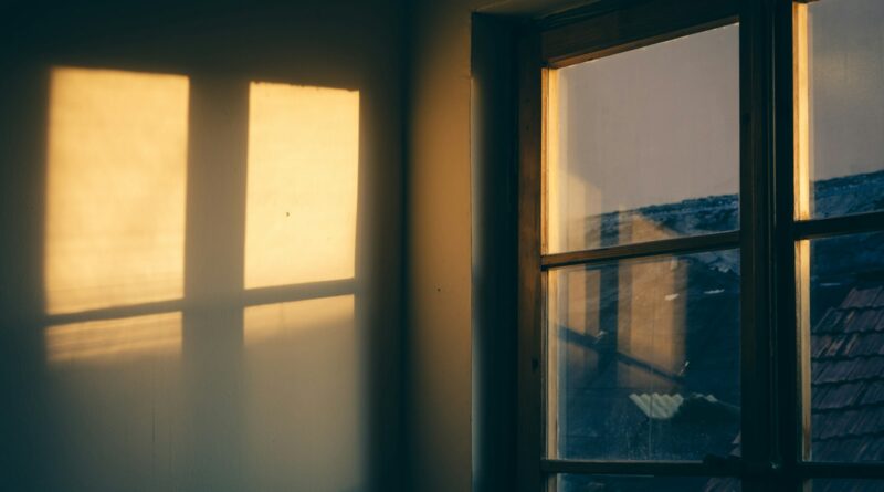 Sunlight streaming through the windows of a house - how to keep your house cool in a heatwave