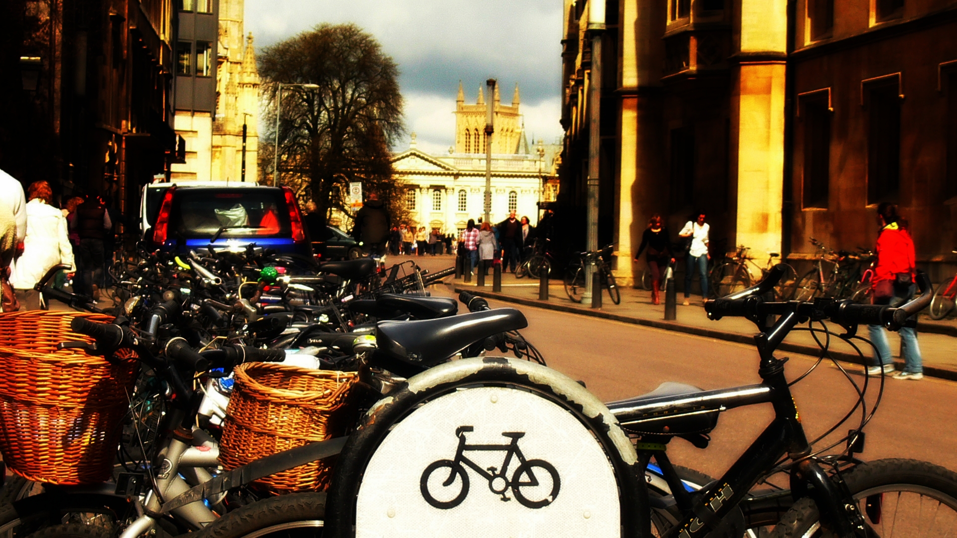 A historic Cambridge street scene with college buildings