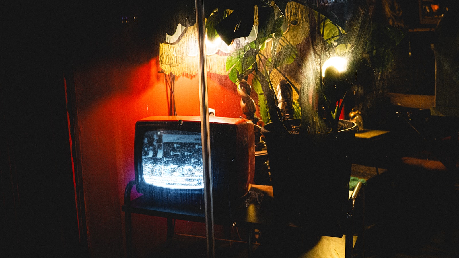 A television glowing in a dark living room - The Rapture BBC review considers whether the boxset drop served the drama