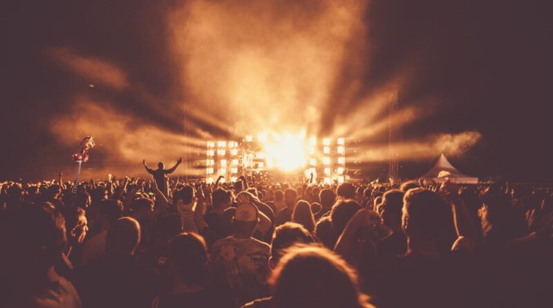 Stage lights over a crowd at a live music show - Van Morrison tour 2026