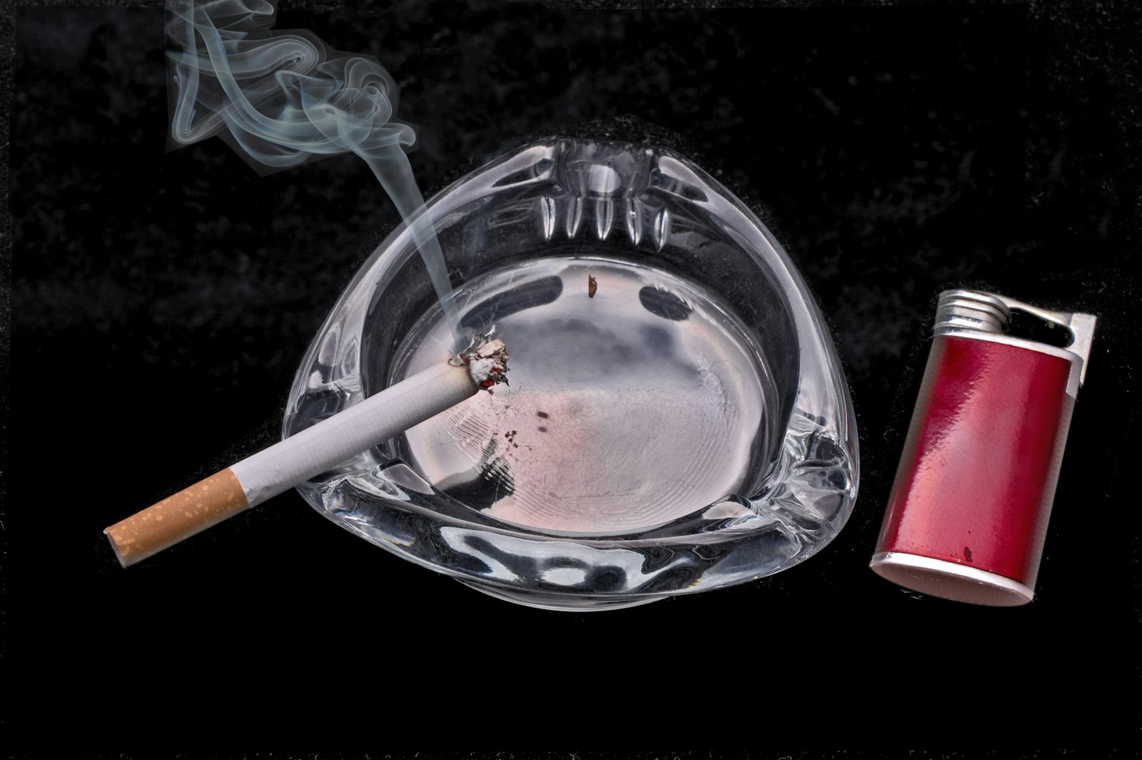 A single cigarette resting on a ceramic ashtray, the habit Stoptober 2026 is asking Britain to drop for 28 days