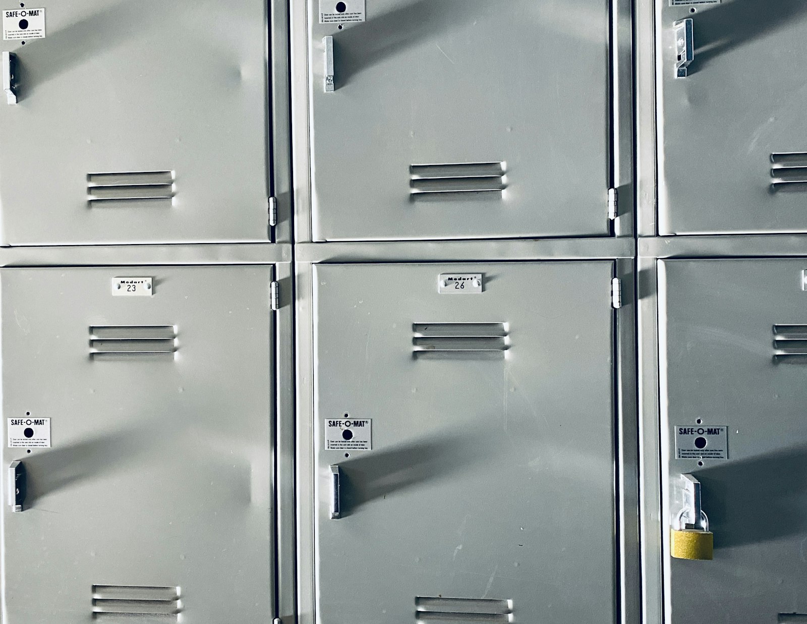 Rows of grey metal gym lockers - the changing room is where nicotine pouches are spreading fastest among young men who never smoked