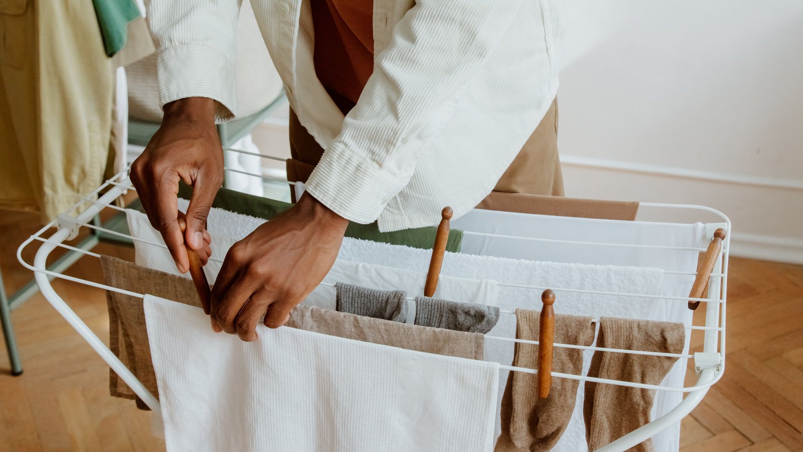 Hanging washing on an indoor clothes drying rack