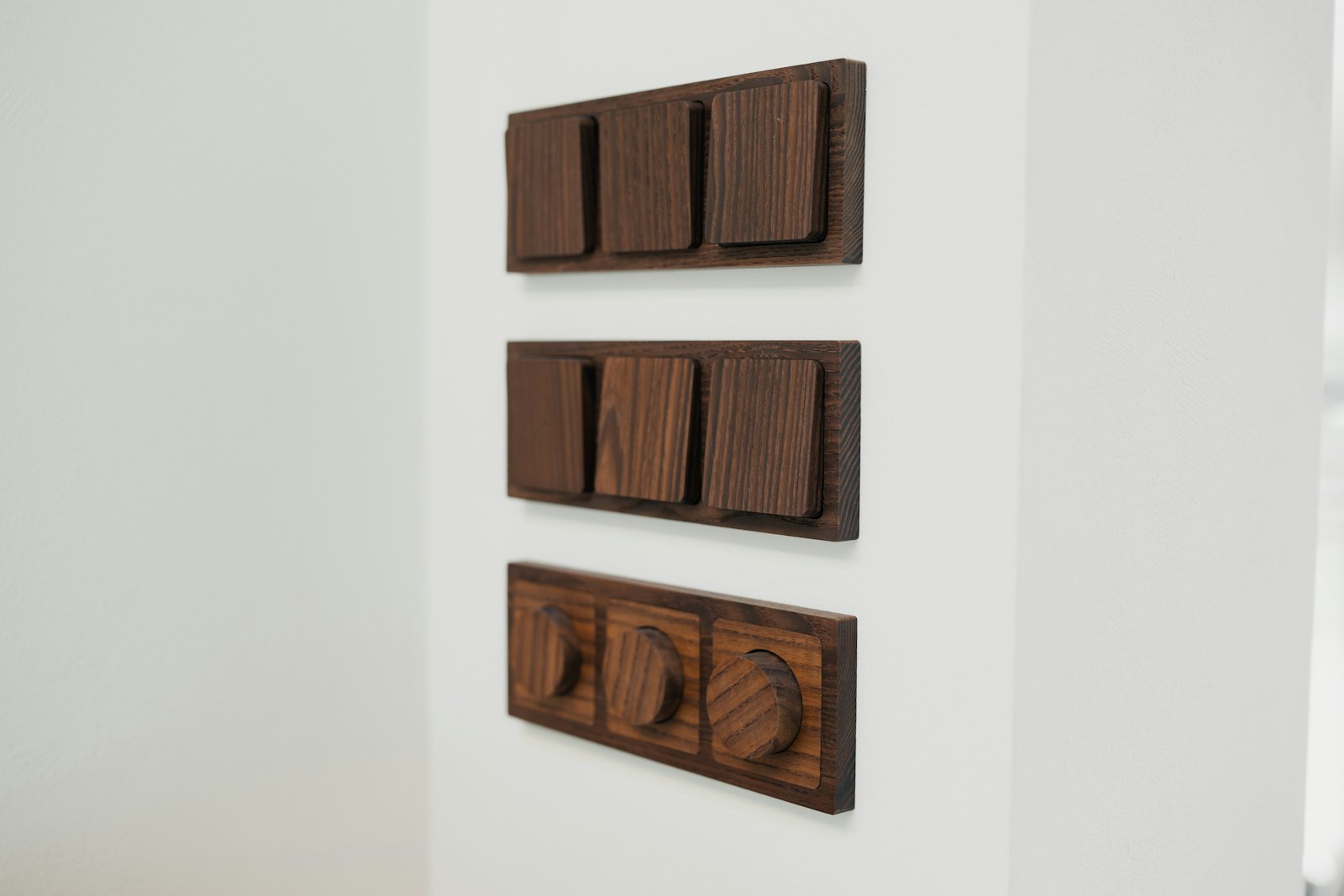 Wooden wall-mounted coat hooks - the cheapest part of any boot room and the most used