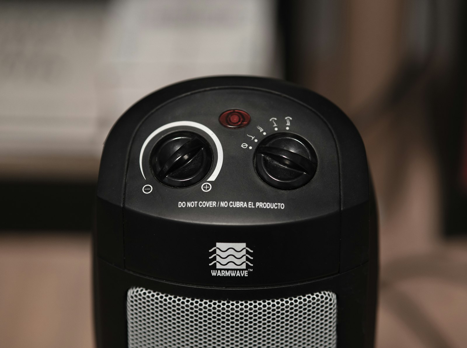 The dials on a 2kW fan heater. The cheapest electric heater to run is whichever one has a thermostat you actually use