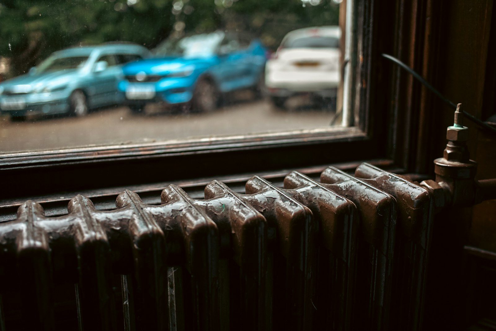 Column radiators in a period sitting room window - the 2026 interiors upgrade